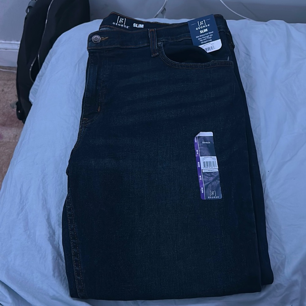 George Slim Dark Blue Jeans. very comfortable. Still has tags. Never worn